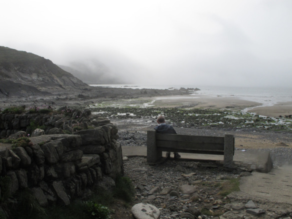 Moody and irrelevant photo: a man watching the fog roll in.